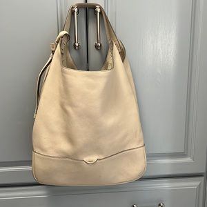 Cream colored bag used 1 season in excellent condition
